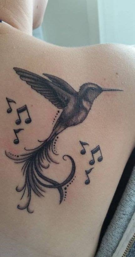 These music notes trail down the back in an elegant manner. 44 Trendy ideas tattoo bird wrist music notes | Tattoos ...