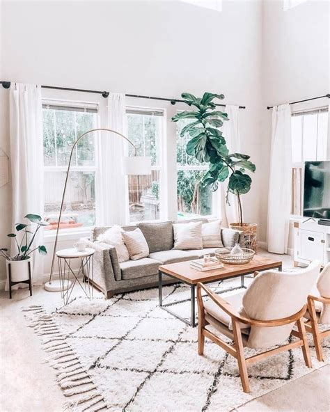 For a minimalist living room, try a gray leather couch with a few simple decor items. Ceni Pyrite Gray Sofa | Living room scandinavian, Minimalist living room, Boho living room