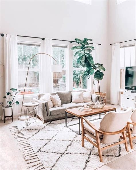 Oftentimes, the living room in an apartment flows right into the kitchen and the dining area — making organization quite a challenge. Ceni Pyrite Gray Sofa | Living room scandinavian, Minimalist living room, Boho living room