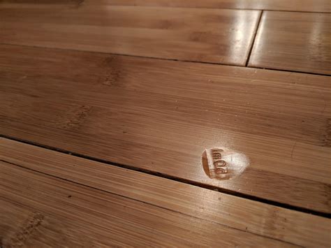 I found this mysteriously detailed dent in my bamboo flooring ...