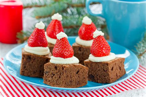 Rich brownies are filled with mint oreos, then topped with a creamy mint chocolate ganache & more! Christmas Brownie With The Mousse On The Side Stock Photo ...