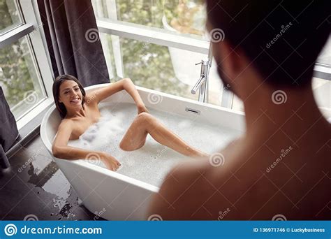 Susan is masturbating hard in the bathroom. Loving Man And Woman Relaxing Together In The Bathtub ...