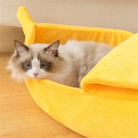 The banana bed features a peelable banana cover that allows your cat to sneak in and out while offering the privacy they require. Banana Cat Bed Warm Durable Portable Pet Basket - Mode Island