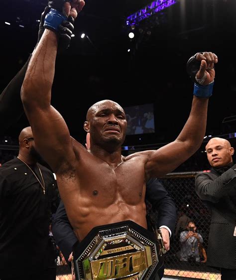 Kamaru usman with his girlfriend and their daughter, samira usman. Nigerian, Kamaru Usman Emotional As He Becomes UFC's First ...