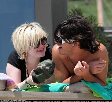 His parents name is ozzy osbourne and sharon osbourne. Make Up Celebrity: Kelly Osbourne and Boyfriend at the Beach