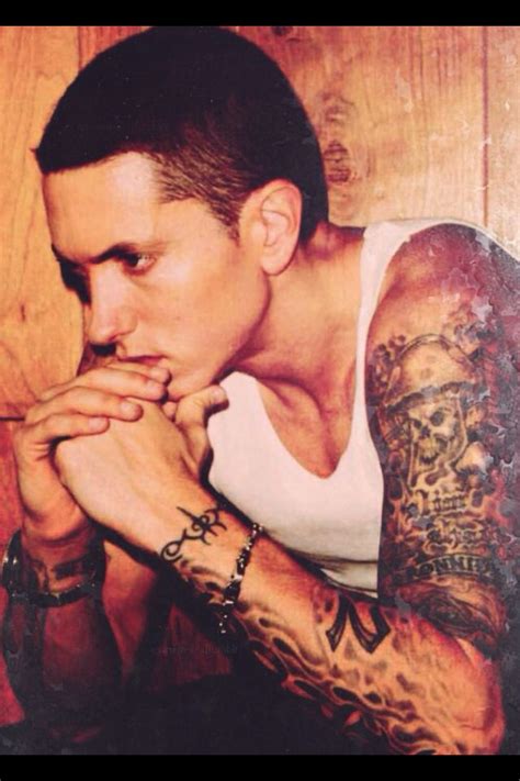 Upper right arm tattoo and middle right arm are considered as eminem's tattoo inside the left forearm in memory of his late best friend and fellow rapper, proof of. Eminem | Eminem, Eminem tattoo, Eminǝm