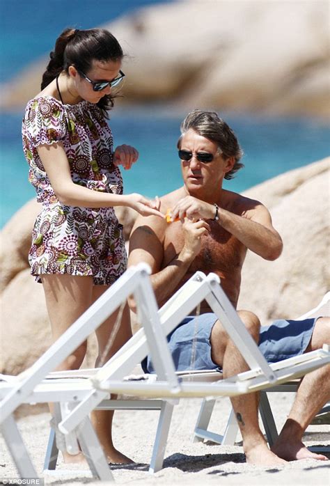 Roberto mancini biography, parents, married, wife, federica mancini, twitter, children, salary, net worth | roberto mancini was born in 1964 and he is italian football manager who was a professional. Roberto Mancini shows off his toned body as he protects ...