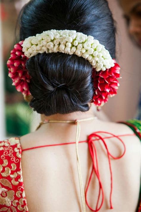 Kind of a hair roll) and a high bun. Indian Bridal Hairstyles - Dahlia and Gajra bridal ...