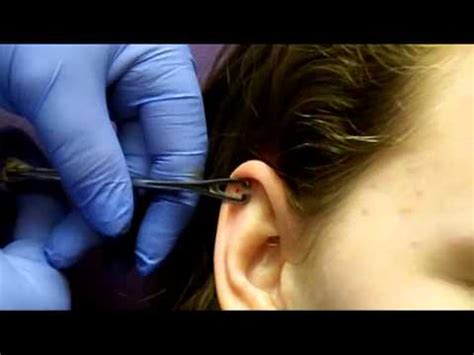 A helix piercing is a piercing along the outer upper cartilage part of your ear. Getting My Cartilage Pierced With Needle - YouTube