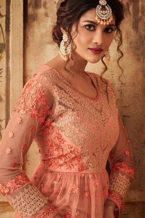 Senior white house advisor ivanka trump and commerce secretary. Buy Floral Embroidered Net Sharara Suit In Peach Colour ...