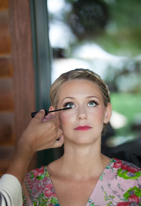 Woman wearing pink eye makeup. Dramatic Eye, Pink Lip Natural Bridal Makeup