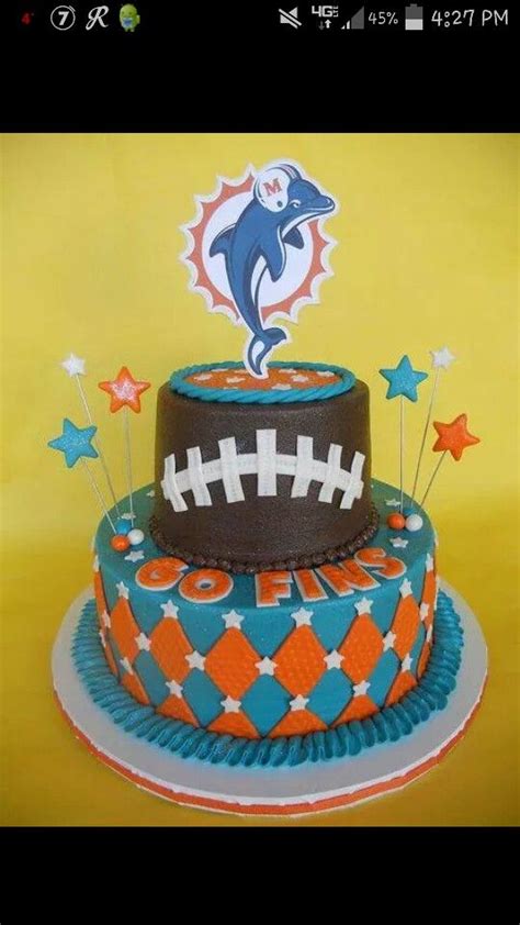 Layon cake topper is 3.50 high. Dolphins cake | Miami dolphins cake, Dolphin cakes ...