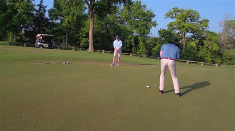 Here are a few steps you can take when filming your next documentary. drone shot of golfers putting on course - YouTube