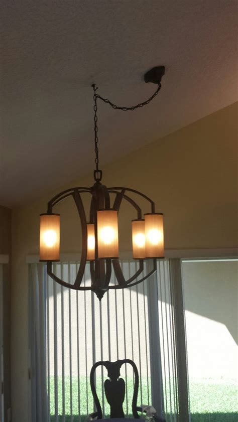 Check spelling or type a new query. do not like swag and hook on new chandelier!! need ideas