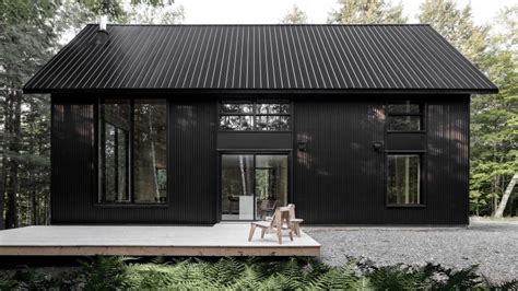 See more ideas about house design, house, house exterior. Appareil Architecture's black metal cabin hides in a ...