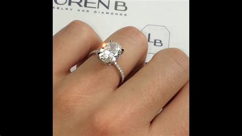 How big is 1 3 carat. 3 carat Oval Diamond Engagement Ring - YouTube