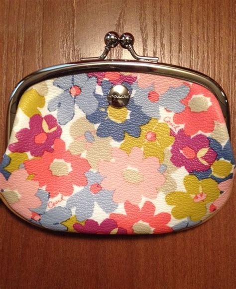 The pattern also calls for small lengths of dk yarns in pinks, purples, blues and yellows for the flowers. NWT Coach Peyton SPRING/SUMMER Floral Print Coin Purse ...