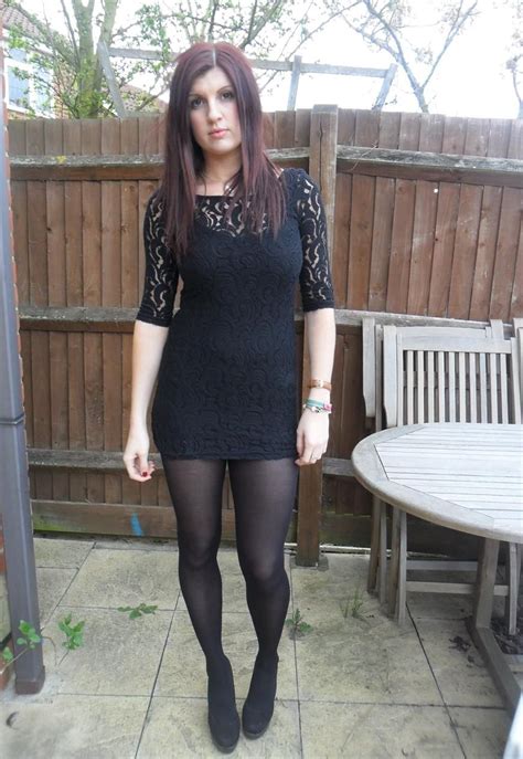 Woman in pantyhose shows her charms. Tights and a black dress | Tight black dress, Black dress ...