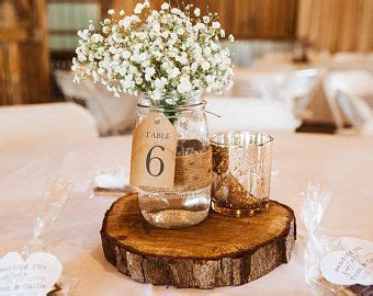 Wood slices and stumps are a beautiful addition to many wedding designs including rustic or western themed weddings. Wood Slab Centerpieces Near Me / Flower And Table Number ...