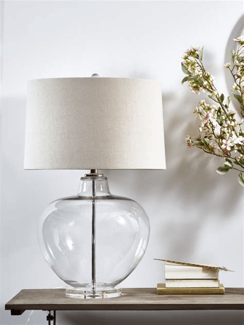 Allowing you to bring portable light where you need it, on an end table, bedroom chest, desk, dining buffet or entry table, a well selected table lamp will also add decorative appeal through color, shape or theme. Edie Glass Table Lamp | Glass table lamp, Table lamps uk, Table lamp