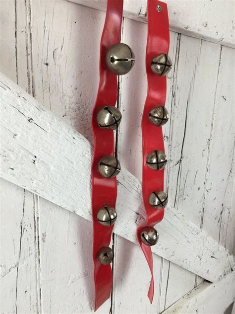 Posted by unknown at 10:30 am. Vintage Sleigh bells on red plastic strap 14 brass sleigh ...