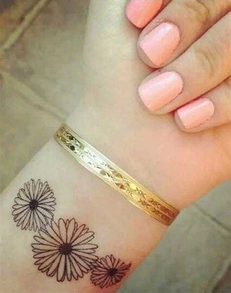 The popularity is not for its sunny charm and breathtaking beauty but for its deep meaning. 18 Amazing Flowers Wrist Tattoos