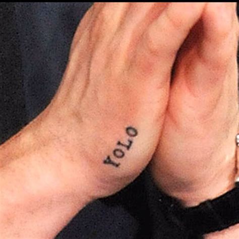 Zac efron is working hard to guide our focus toward his talent and less on his beauty (yea good luck). Zac Efron- you only live once, yolo! | Tatoo