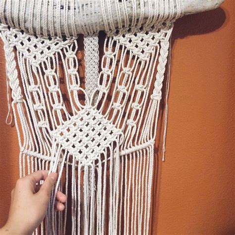 Maybe you would like to learn more about one of these? Macrame wall hanging in progress by macrameforest