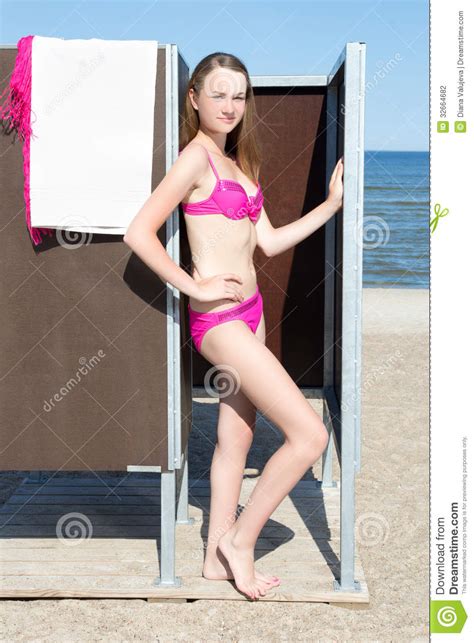 First, we can admire her. Slim Beautiful Woman In Dressing Cabin On The Beach Stock ...