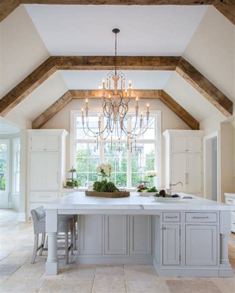 Stained or natural wood beams below or against a white vaulted ceiling can read as cozy, kitsch, woodsy or homey. Kristen Peake Interiors | Vaulted ceiling kitchen, Elegant ...