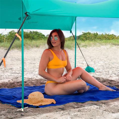 Sometimes being sheltered is a good thing. Red Suricata Family Beach Sunshade - Sun Shade Canopy ...