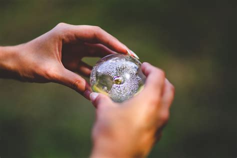 Crystal ball in hands · Free Stock Photo