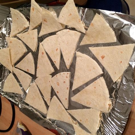 Just heat in the oven and enjoy! Spicy Tortilla Chips · How To Cook A Bowl Of Nachos ...