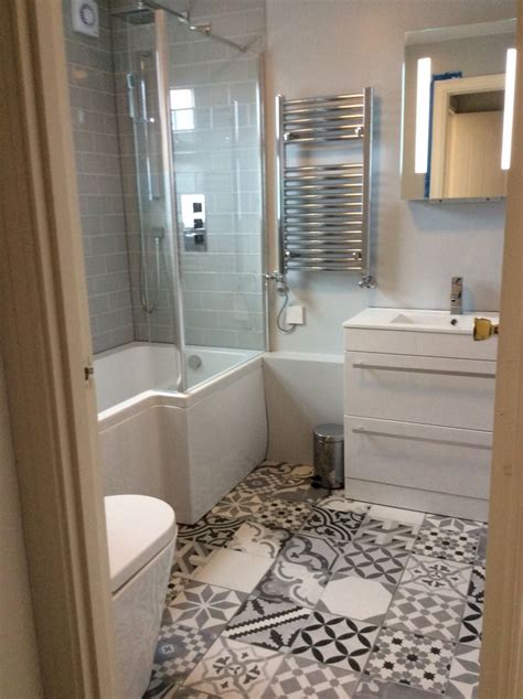 We sold our first home only three days after listing it. Bathroom Flooring Tiles White - Idalias Salon