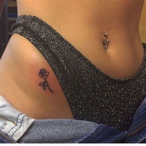 What does it mean to have a rose tattoo on your body? Tiny rose tattoo hip bone | Tattoos, Small tattoos, Tiny ...
