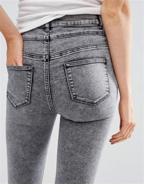 Not only do clothes rub against one another, but the detergent, along with zippers, buttons, and snaps, can be damaging to the color. New Look Denim Acid Wash Skinny Jeans in Gray Acid (Gray ...