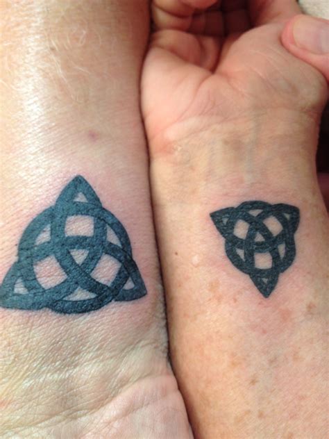 Antique spirituality meets modern fashion with the widespread induction of celtic cross tattoos. Husband & wife | Wife tattoo, Husband tattoo, Scottish tattoos