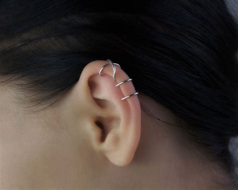Maybe you would like to learn more about one of these? Set of Solid Gold Cross EarCuffs Real Gold Criss Cross ...
