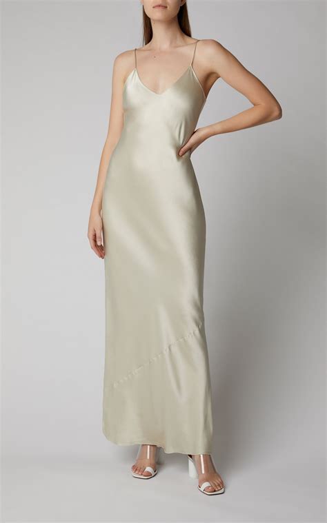 A marital dress, typically all white and decorated with frills and veils. Cami Silk-Charmeuse Gown | Silk charmeuse, Slip wedding ...