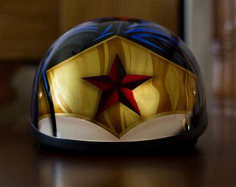 Their use is required by law in many countries. Image result for wonder woman motorcycle helmet ...