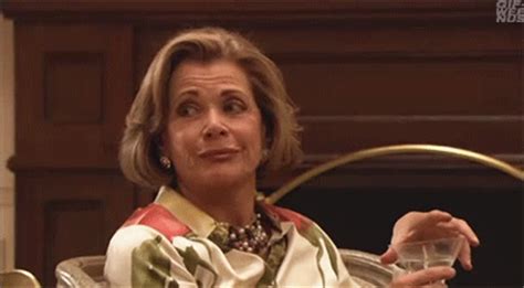 This is an animated reaction gif of lucille bluth closing over a door while looking unamused and unimpressed. lucille bluth gifs | WiffleGif