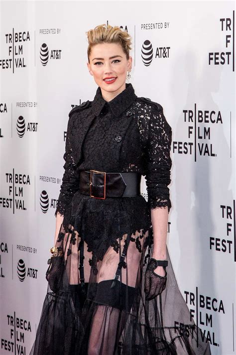 Amber heard dresses, amber heard skirts, amber heard coats, amber heard styles，amber heard fashion，amber heard red carpet, amber heard jumpsuit, amber heard outfits. amber heard looks stunning in a black sheer dress as she ...