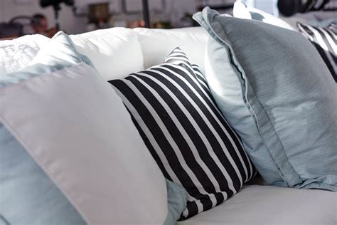 Nothing adds to the style and comfort of your living room sofa like a decorative pillow arrangement. pillows-white-sofa