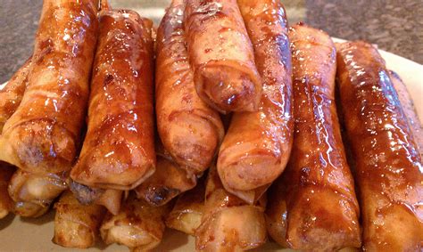 Also known as lumpiang saging (filipino for banana lumpia), is a philippine snack made of thinly sliced bananas (preferably saba or cardaba bananas), dusted with brown sugar, rolled in a spring roll wrapper and fried. TURON - Sweet banana or red yam spring rolls. (With images ...