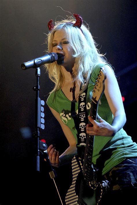 Almost time for my new music, are you ready? AVRIL LAVIGNE Performs at A Big Rock Day in Bangkok 03/27/2005 - Сelebs of World