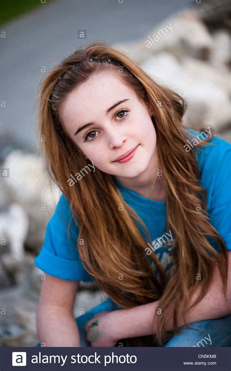 | fashion teenage girls, portrait shots. a young 13 14 year old teenage girl, uk Stock Photo - Alamy