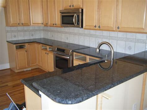 We chose the dallas white granite but chose grey cabinets and i tried googling to see if i could find anything, found 1 picture and i wasn't impressed. Steel Grey Granite Countertops | http://www.fireplacecarolina.com | Granite Countertops ...