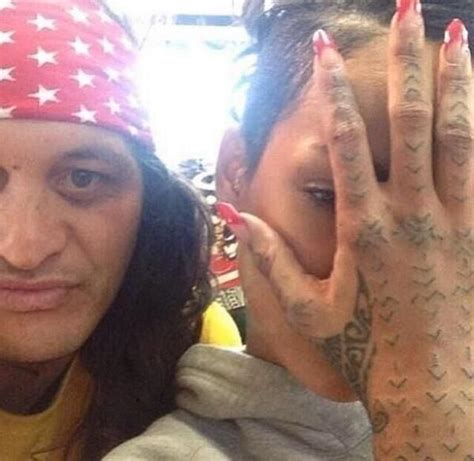 Rihanna has over 20 tattoos. Rihanna's New Hand Tattoo (Traditional Maori (Moko) Tattoo)