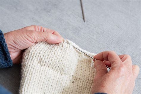 This video shows you how to pick up stitches knitwise along the vertical edge of a stockinette stitch swatch. How to Pick-up Stitches Around a Neckline | Stitch ...