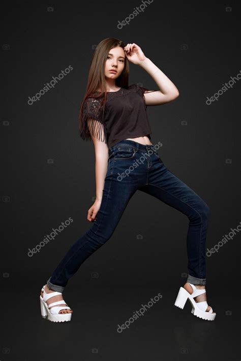 Pretty 13 years old girl. Pretty 13 year olds black | A beautiful 13-years old girl dressed in jeans and T-shirt in studio ...